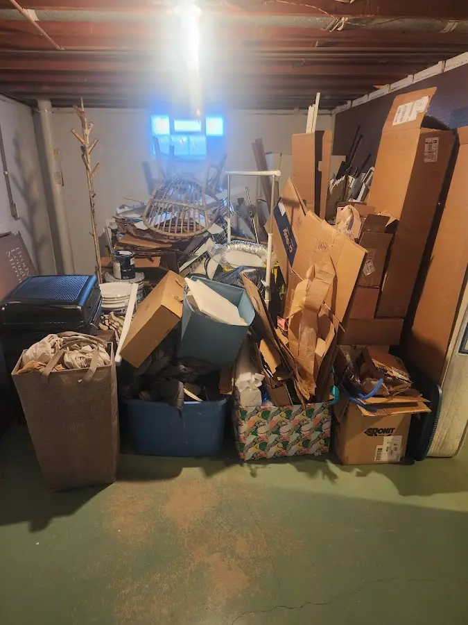 Roll-off dumpster container at job site for 2 Yard Dumpster Rental in Lake Arrowhead